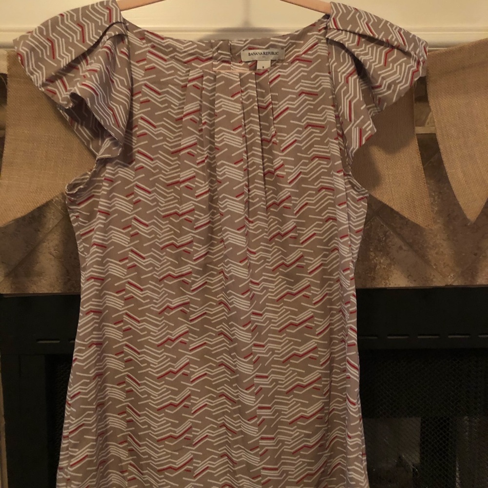 Tan Banana Republic blouse ruffled cap sleeves.